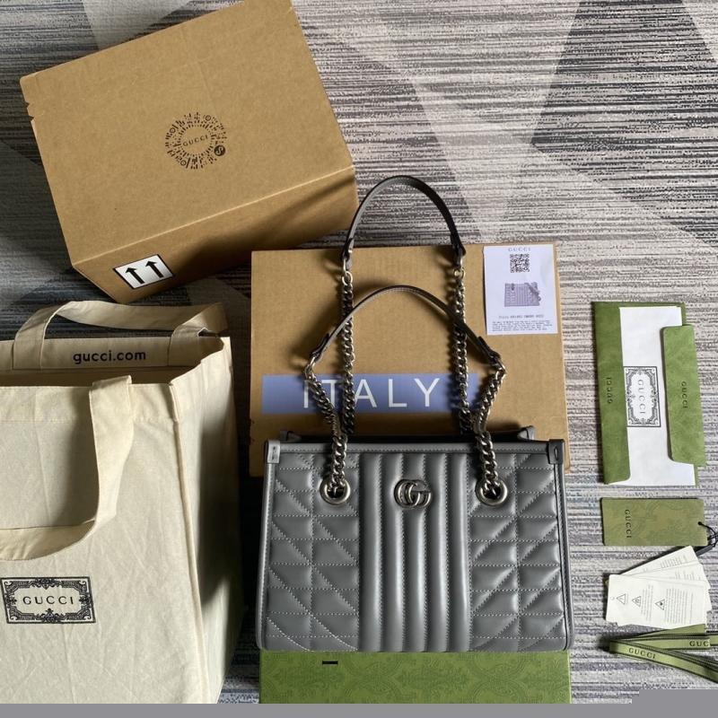 G*u*i shopping bags